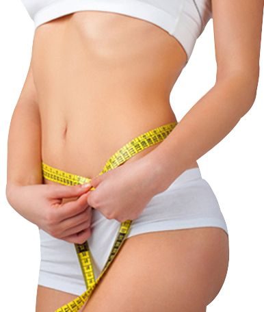 Patient measuring waistline after abdominal SmartLipo contouring treatment